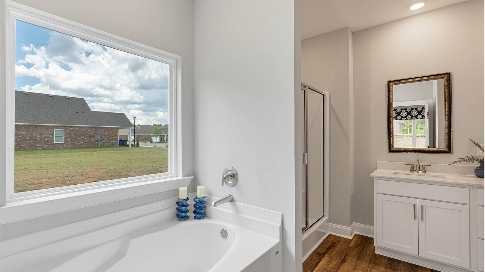 Rhett floorplan with quartz countertops, soft close cabinets, and LVP flooring