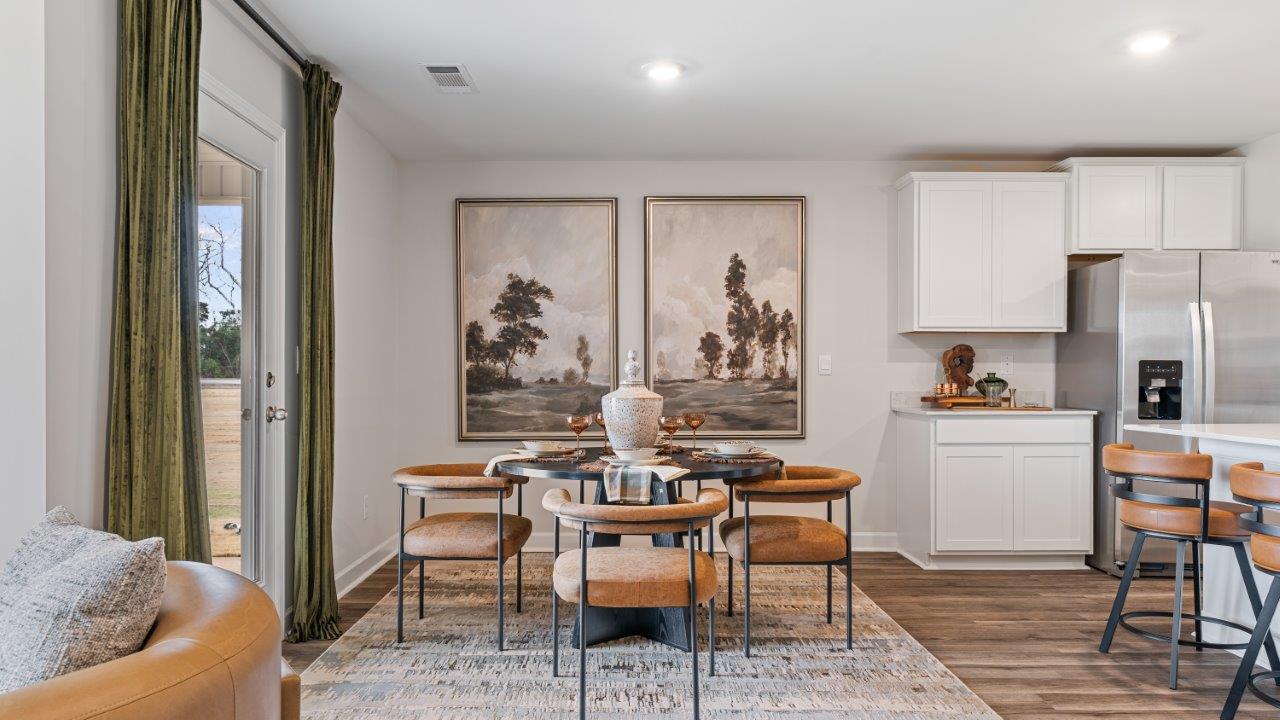 Dining space seamlessly connected to kitchen and living room