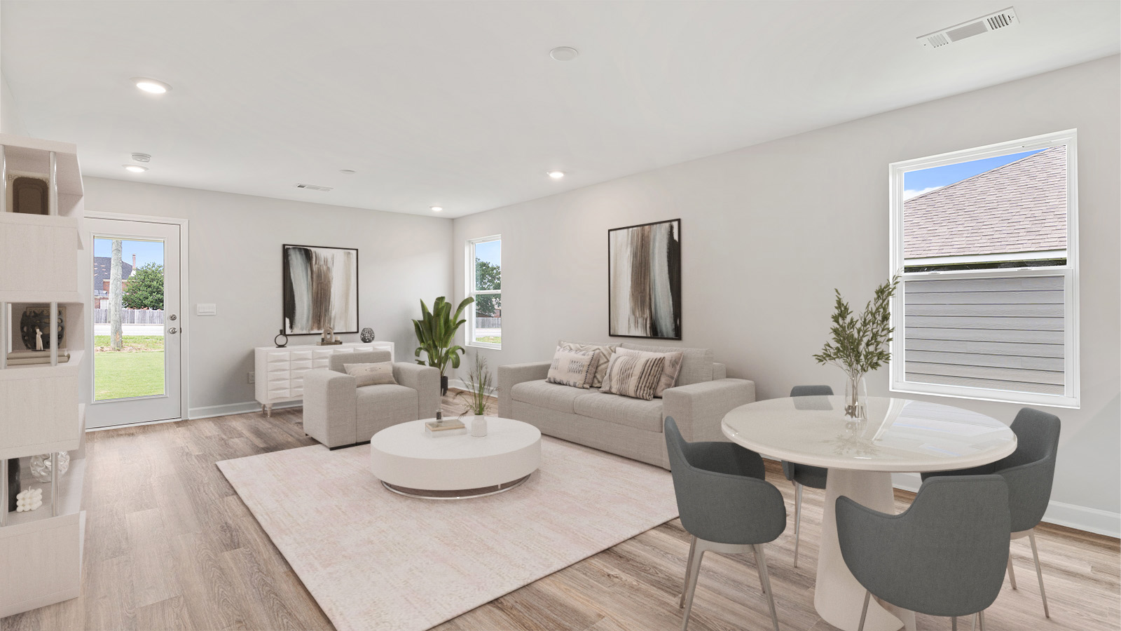 Open family room with abundant natural light and LVP throughout