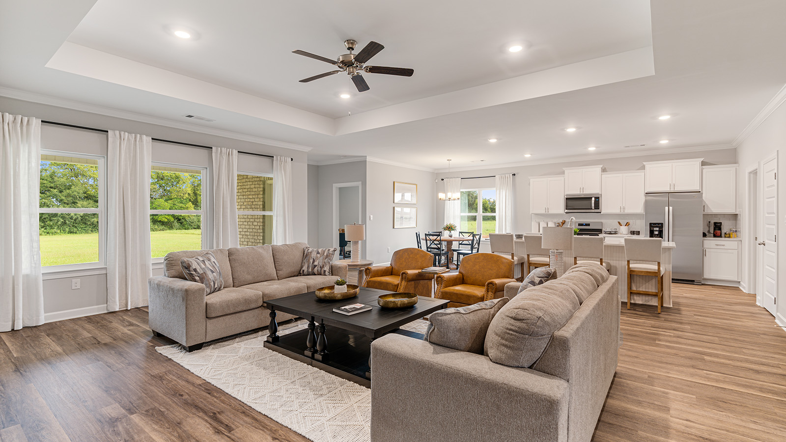 The Destin floorplan interior with quartz countertops, LVP flooring, and open concept living.