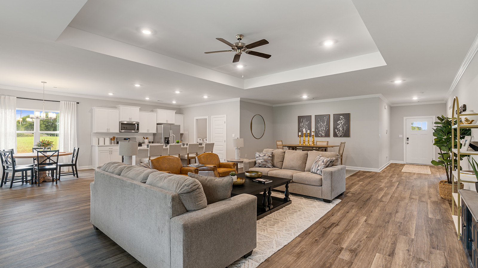 The Destin floorplan interior with quartz countertops, LVP flooring, and open concept living.
