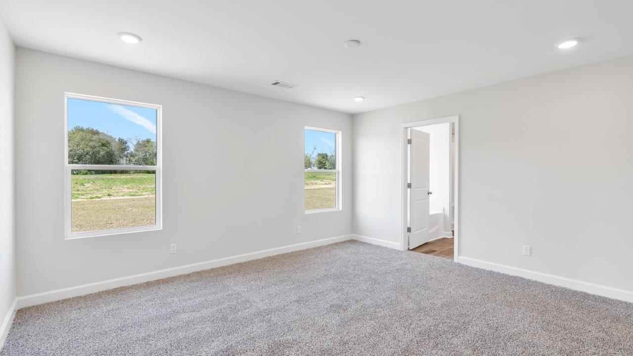 Mohawk carpeted bedrooms, natural lighting, new construction home