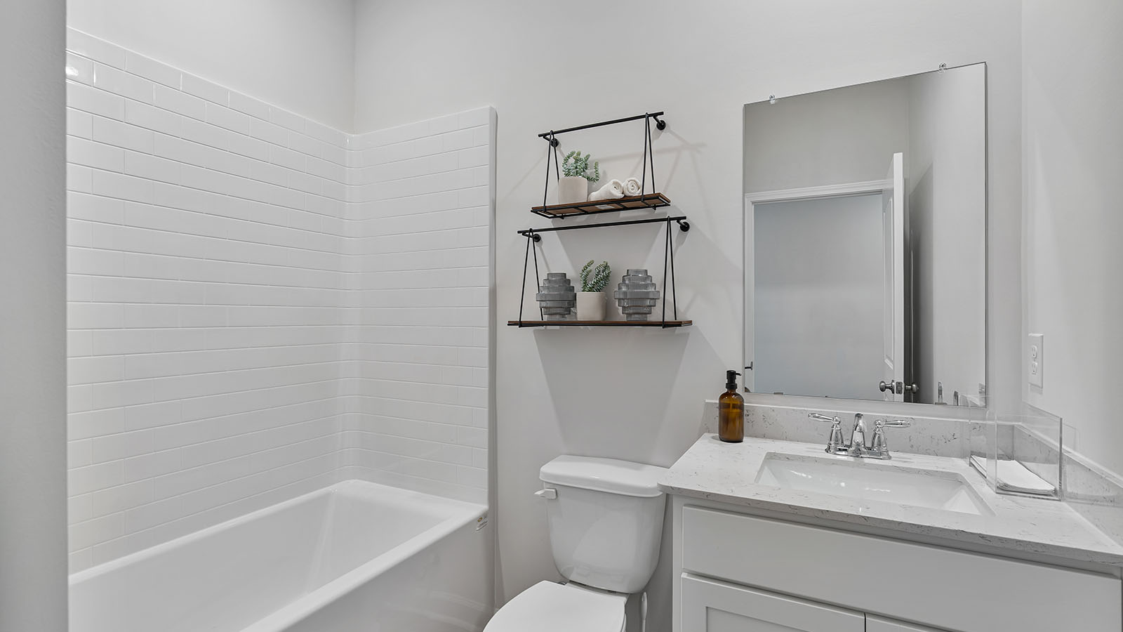 luxury vinyl plan flooring in bathrooms with quartz countertops