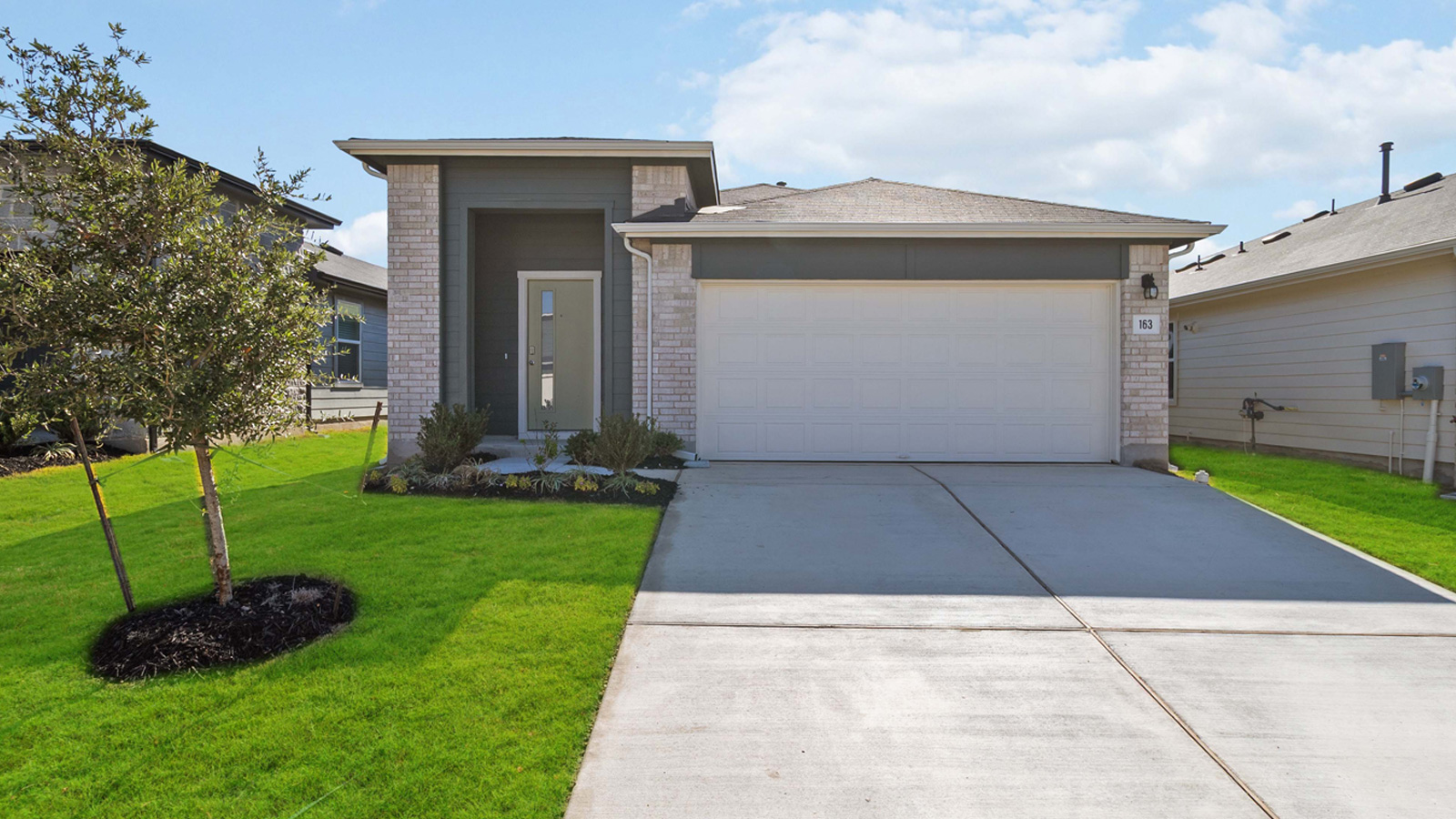 The Diana - N Elevation at Southgrove in Kyle, TX.