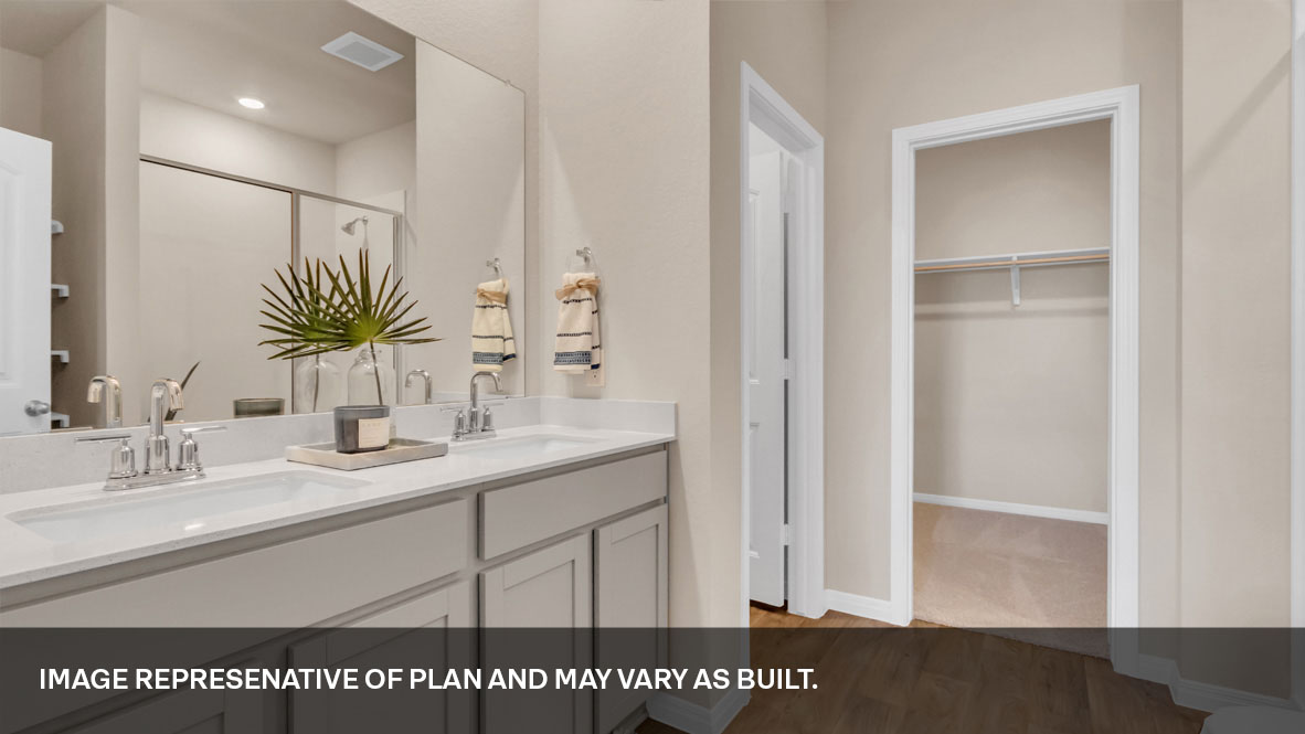 Primary bathroom with double vanity.