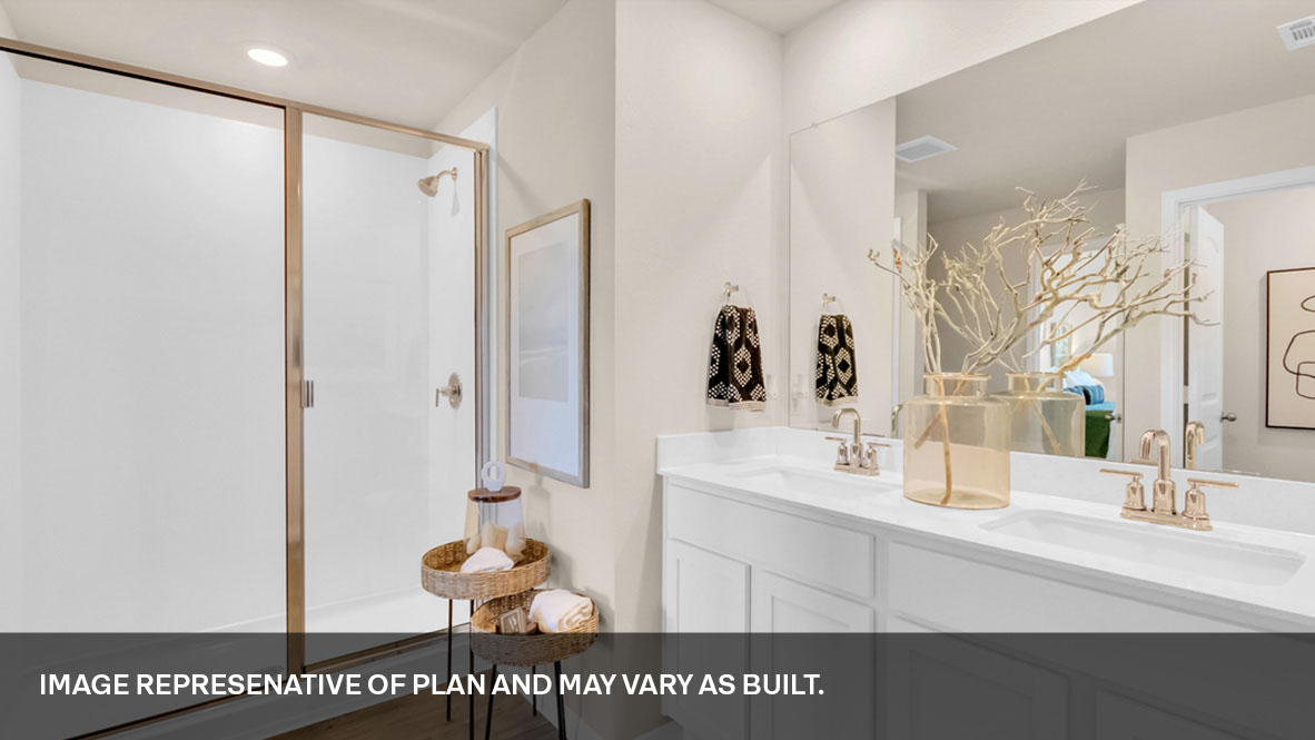 Primary bathroom with double vanity.