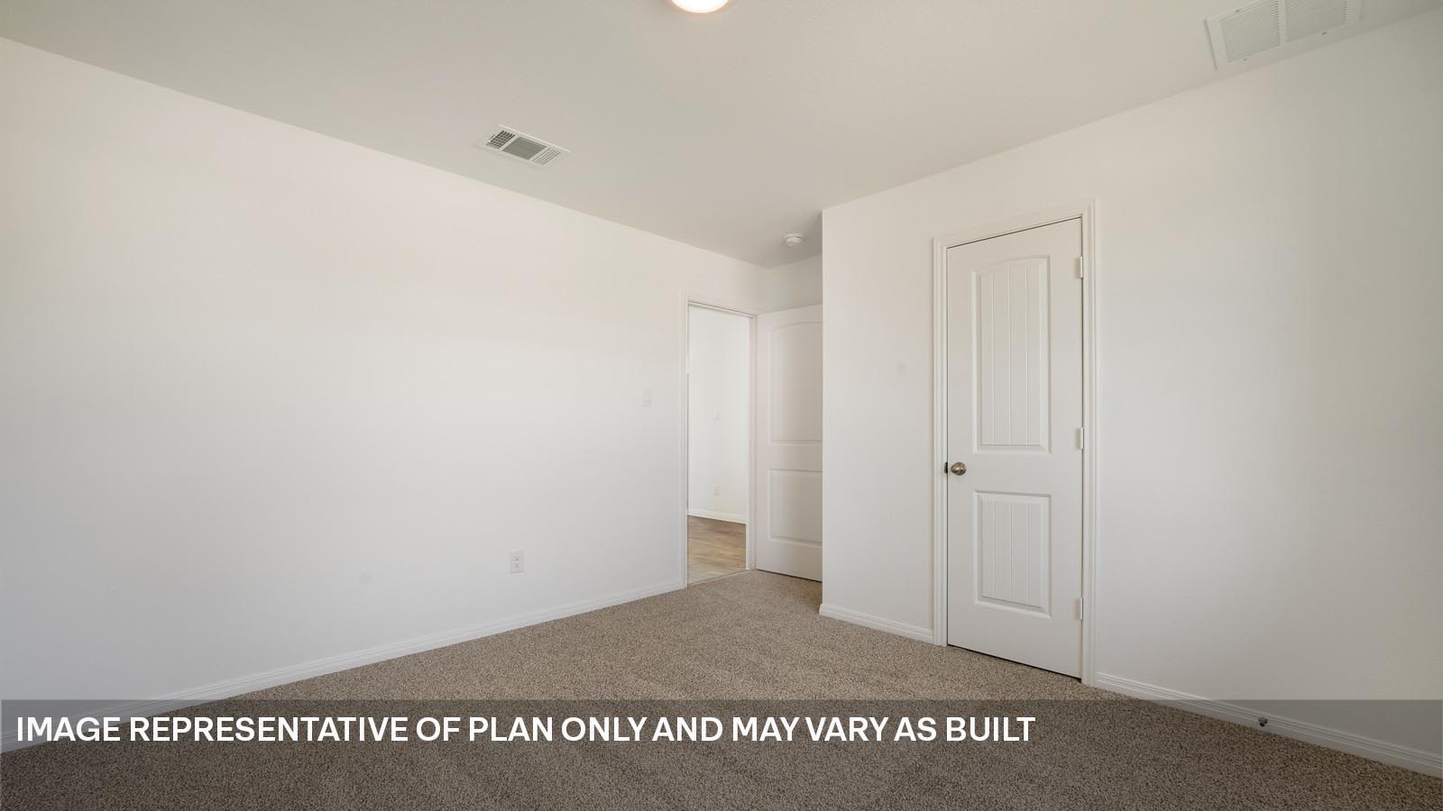 Bedroom 2 with two windows.
