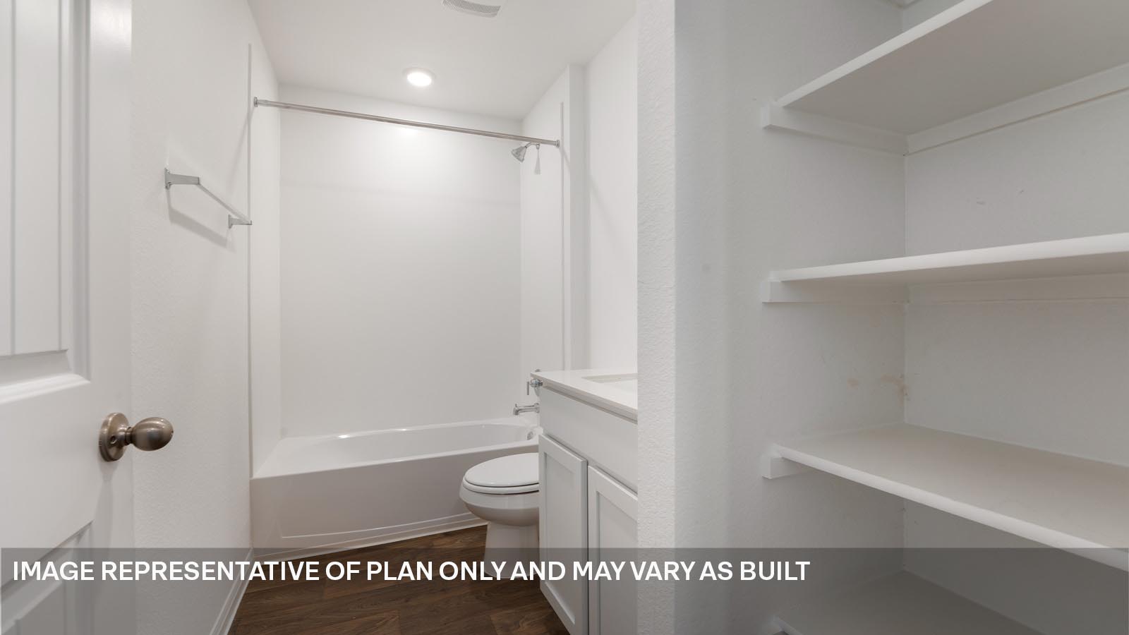 Bathroom 2 with shelving.