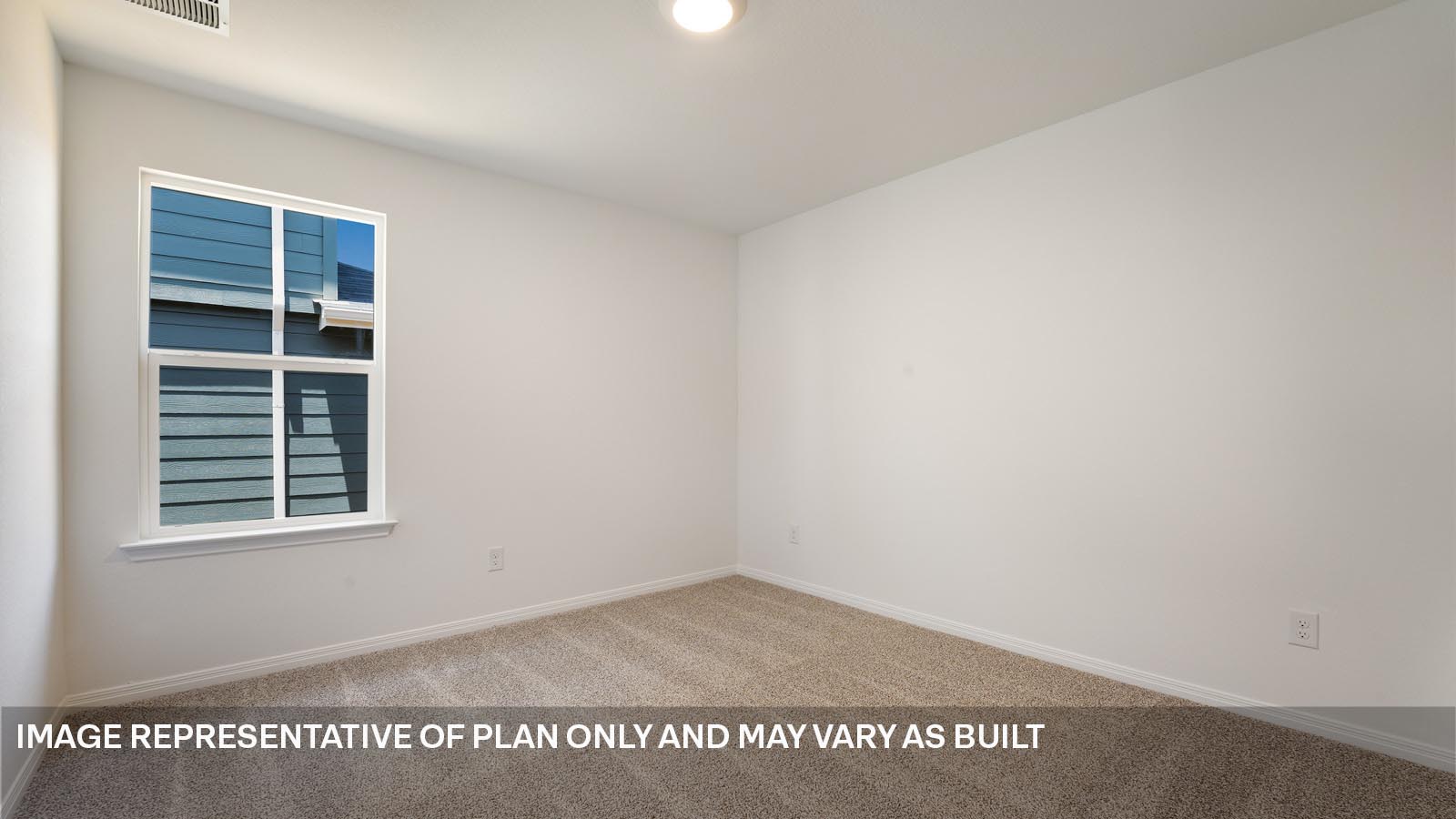 Bedroom 3 with window.