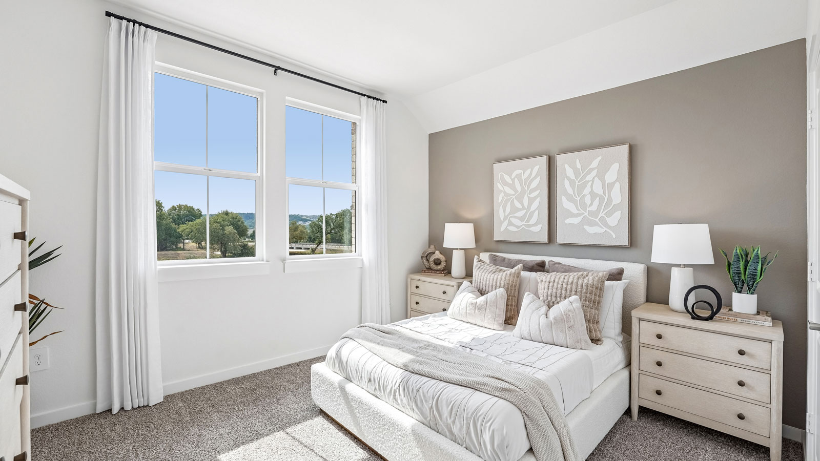 Bedroom 4 with two large windows, carpeted flooring and closet.