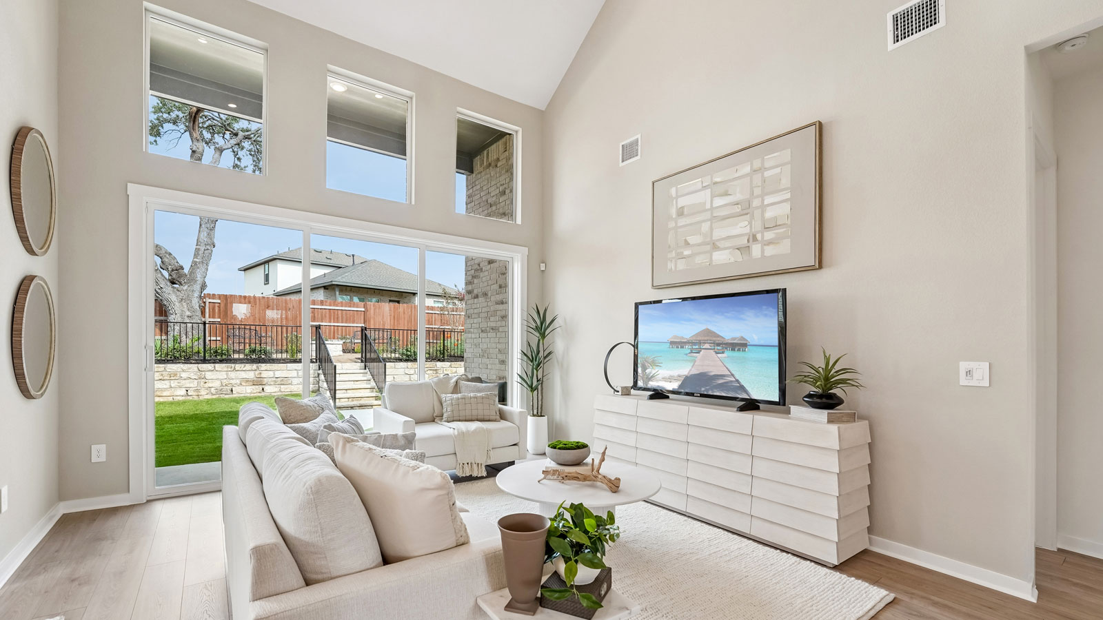 Open living area with large windows.