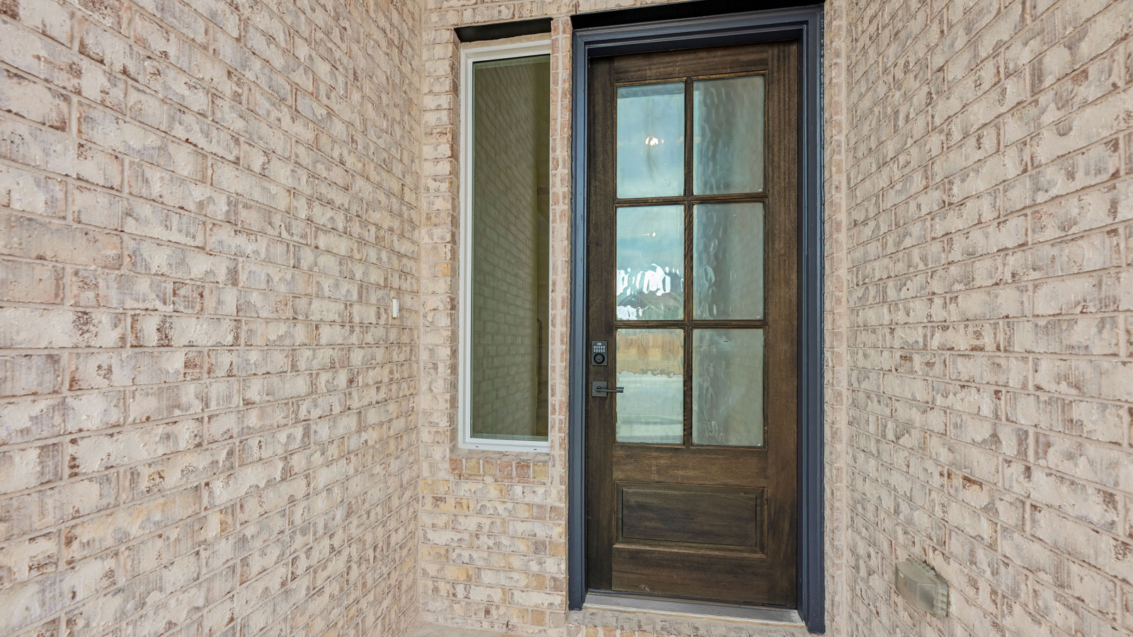The Ingram Floorplan - Y Elevation at The Enclave at Bar W Ranch in Leander, TX.