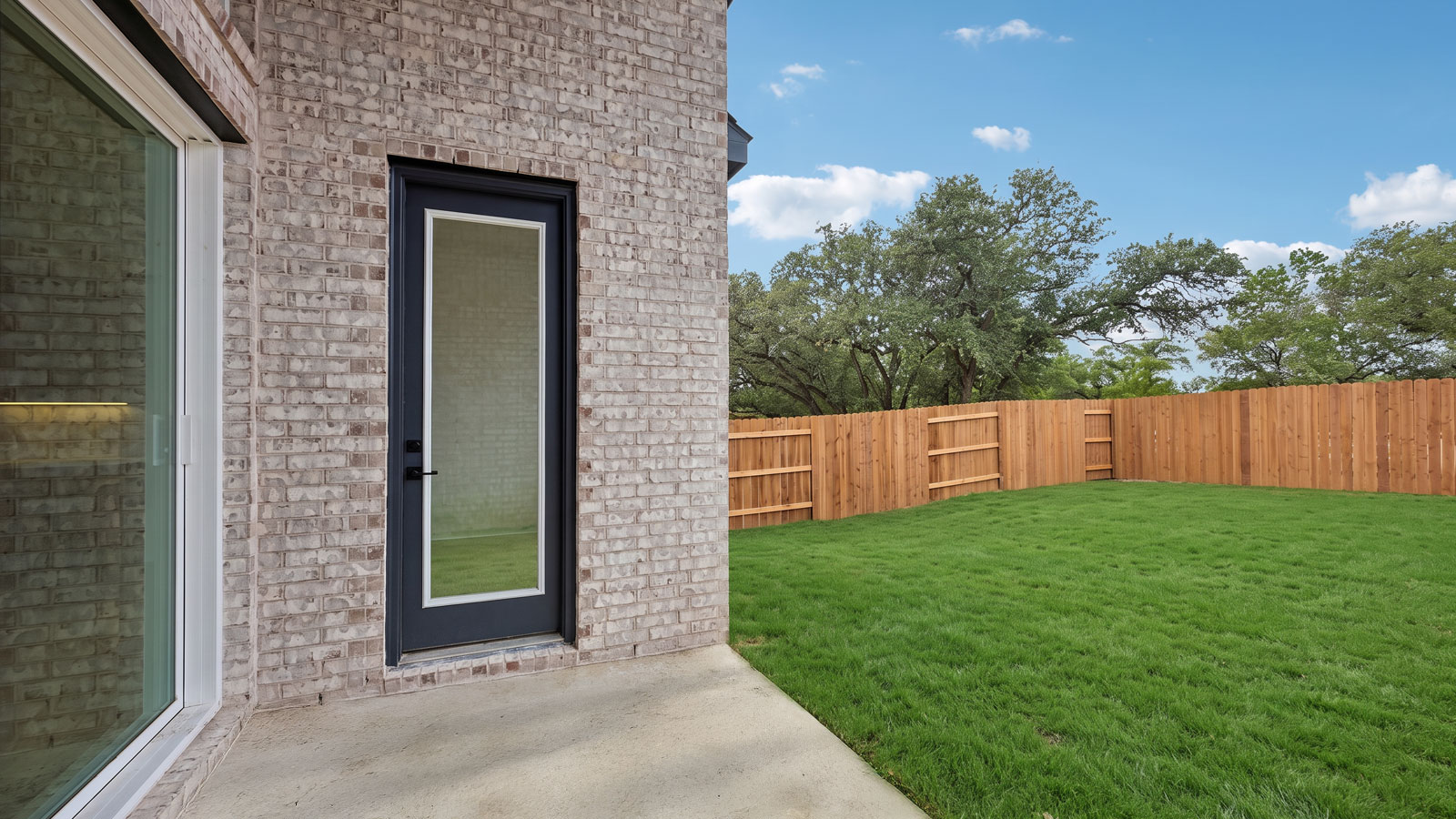 The Ingram Floorplan - Y Elevation at The Enclave at Bar W Ranch in Leander, TX.