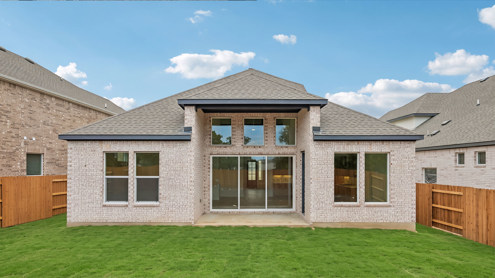 The Ingram Floorplan - Y Elevation at The Enclave at Bar W Ranch in Leander, TX.