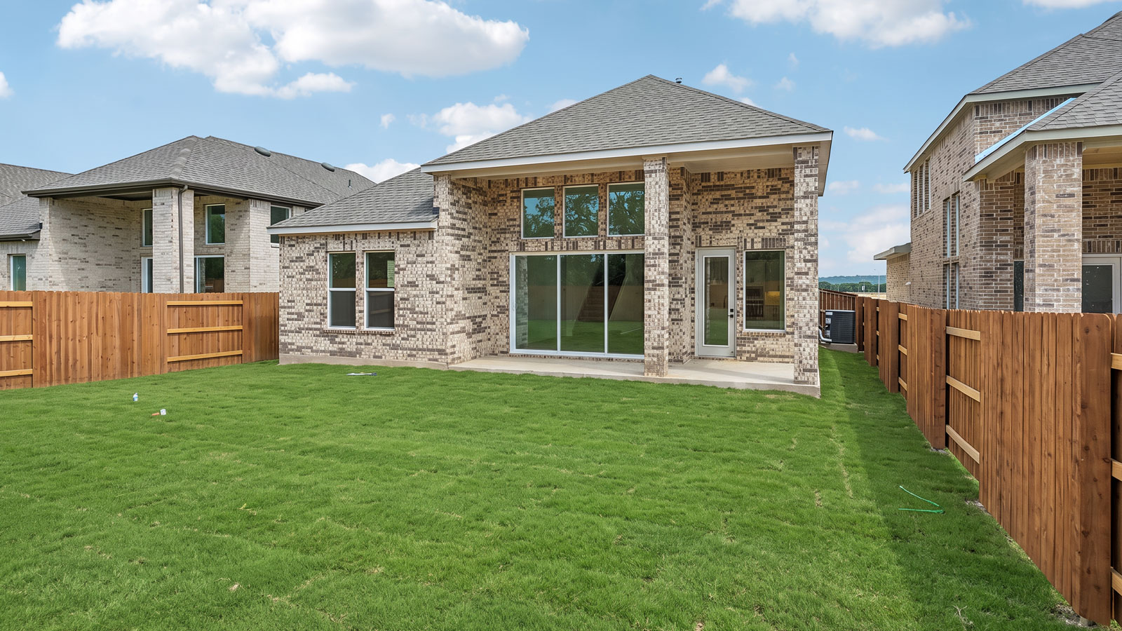 The Keller Floorplan - W Elevation at The Enclave at Bar W Ranch in Leander, TX.