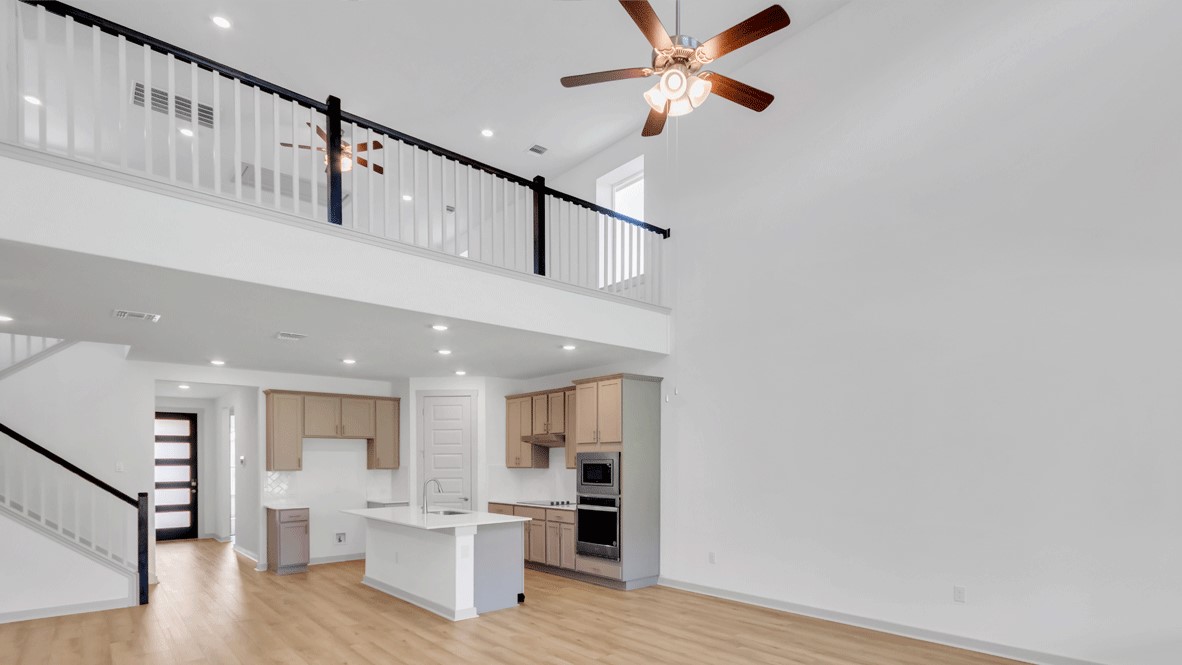 Front entry two-story living room in Thunder Rock ideal for bright open entertaining