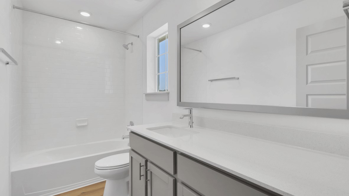 Private owner’s suite with multiple doorways including entry to en suite bath and closet in Thunder Rock