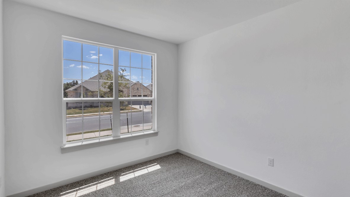 Spacious D.R. Horton flex room offering versatile design potential in a new home setting