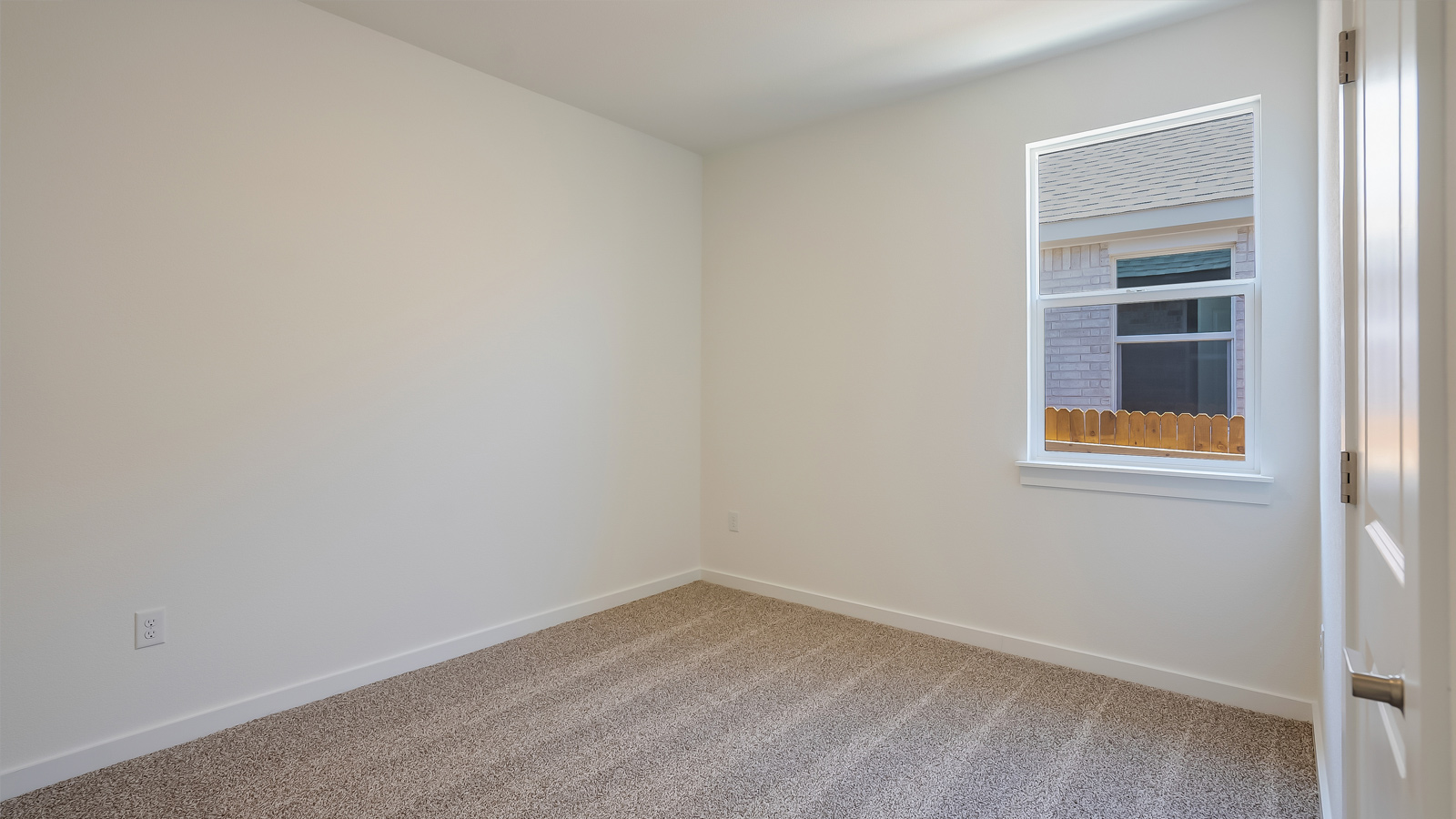 Bedroom 3 designed for everyday comfort with closet storage and shared bath access