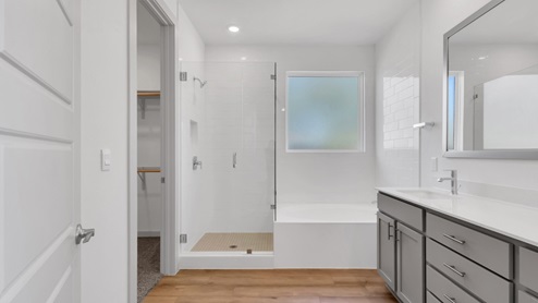 Main Bathroom with Walk-in Shower with Frameless Enclosure