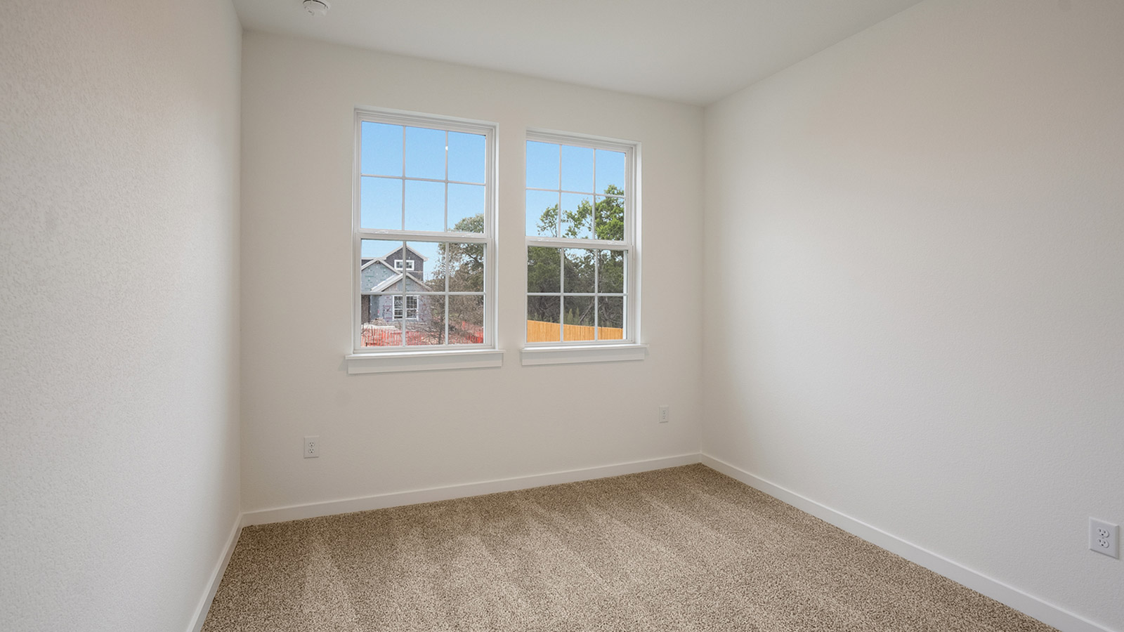 Secondary bedroom, flex-office, study, entertainment, game, craft room options in this D.R. Horton new construction home