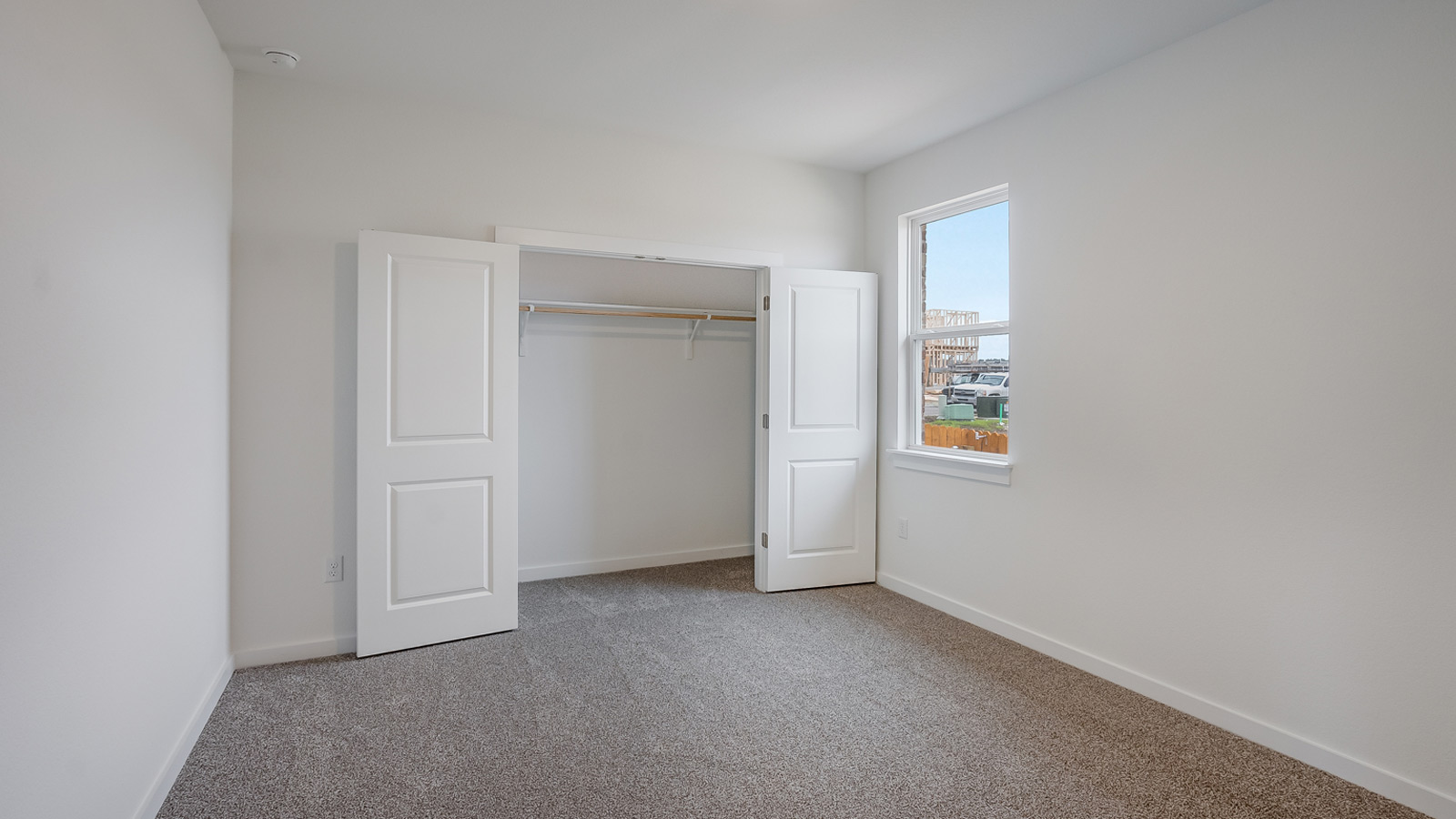 Bedroom 4 with carpeted floors.