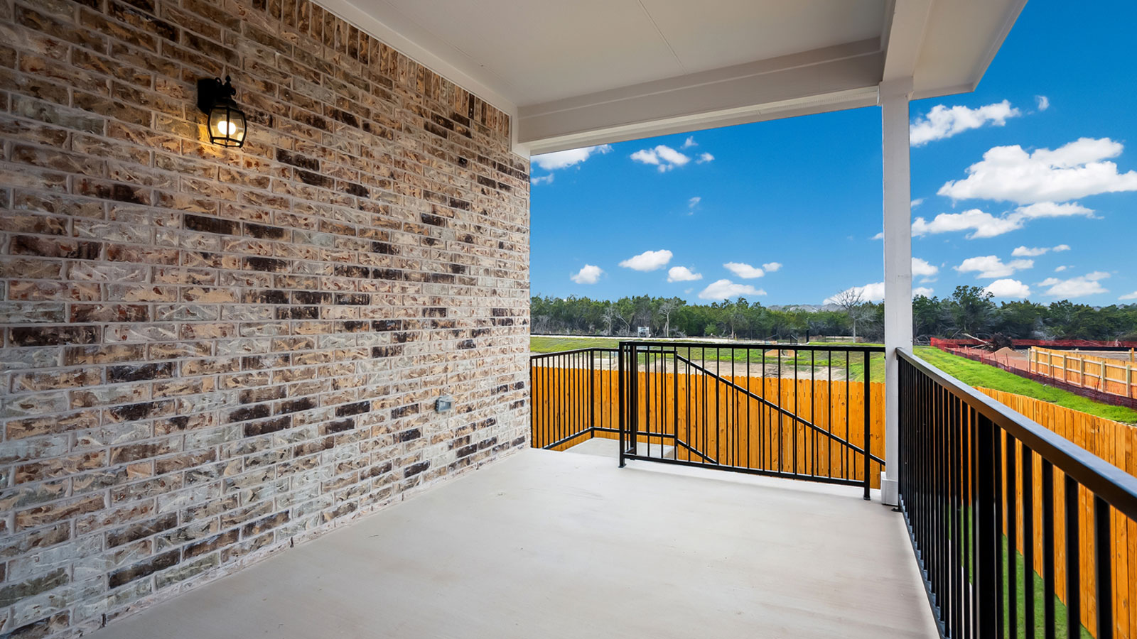 Backporch of the Salinger floorplan at Rosenbusch Ranch in Leander, TX.