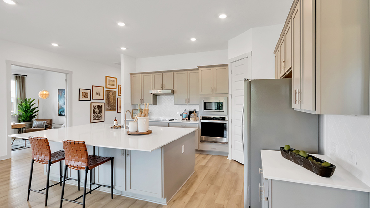 New appliances included, our larger kitchen island with seating anchor the kitchen, next to dining, great rooms, pantry