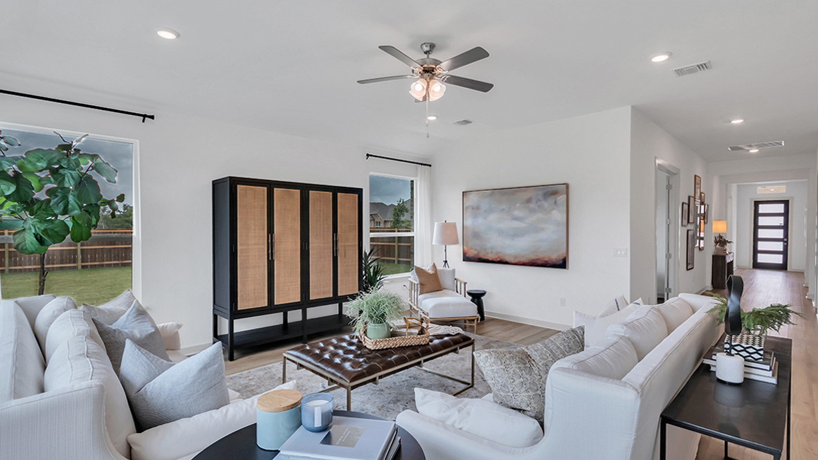 Living room features quality throughout, fresh open concept flowing to the kitchen, dining areas, at Rosenbusch Ranch