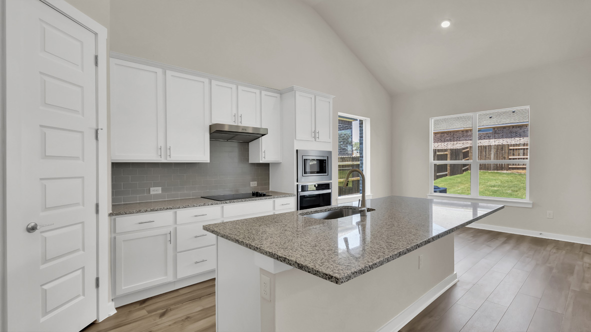 New build home features central island design, pantry, multi-prep zones, sink, dining and living rooms, outside areas