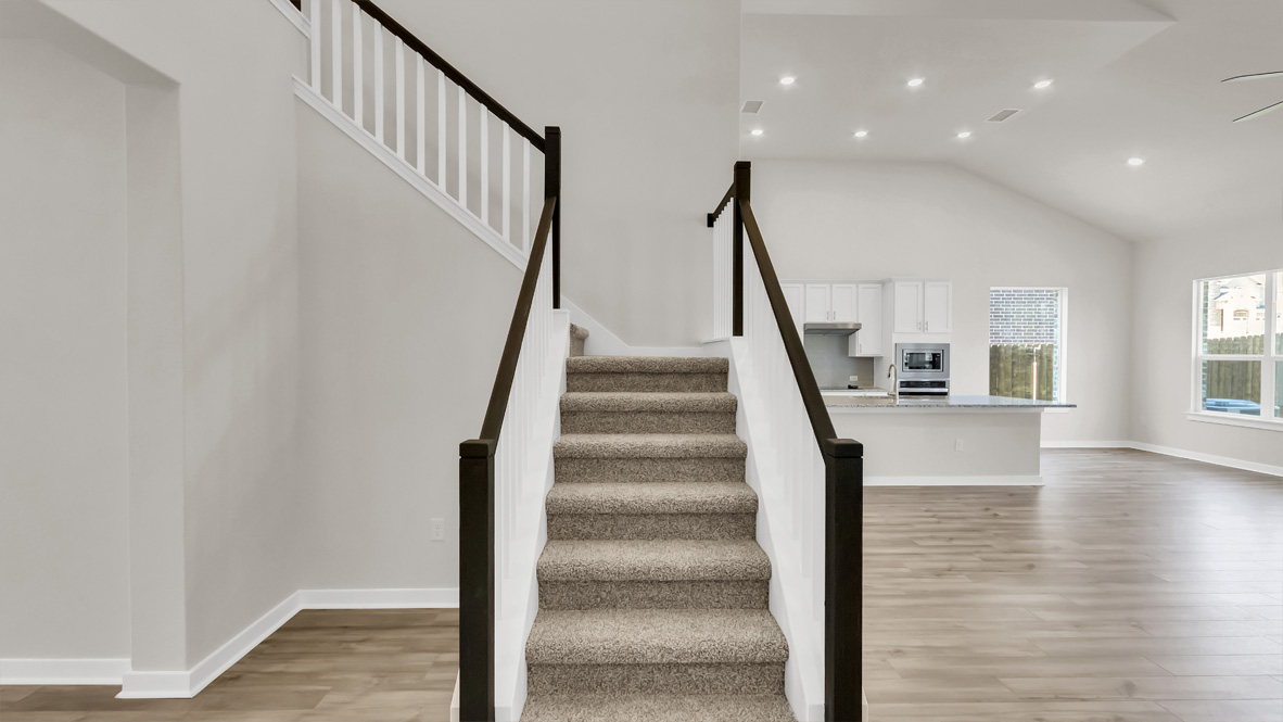 Front Door and stairs access of this new residence bring you home with well-crafted and designed living