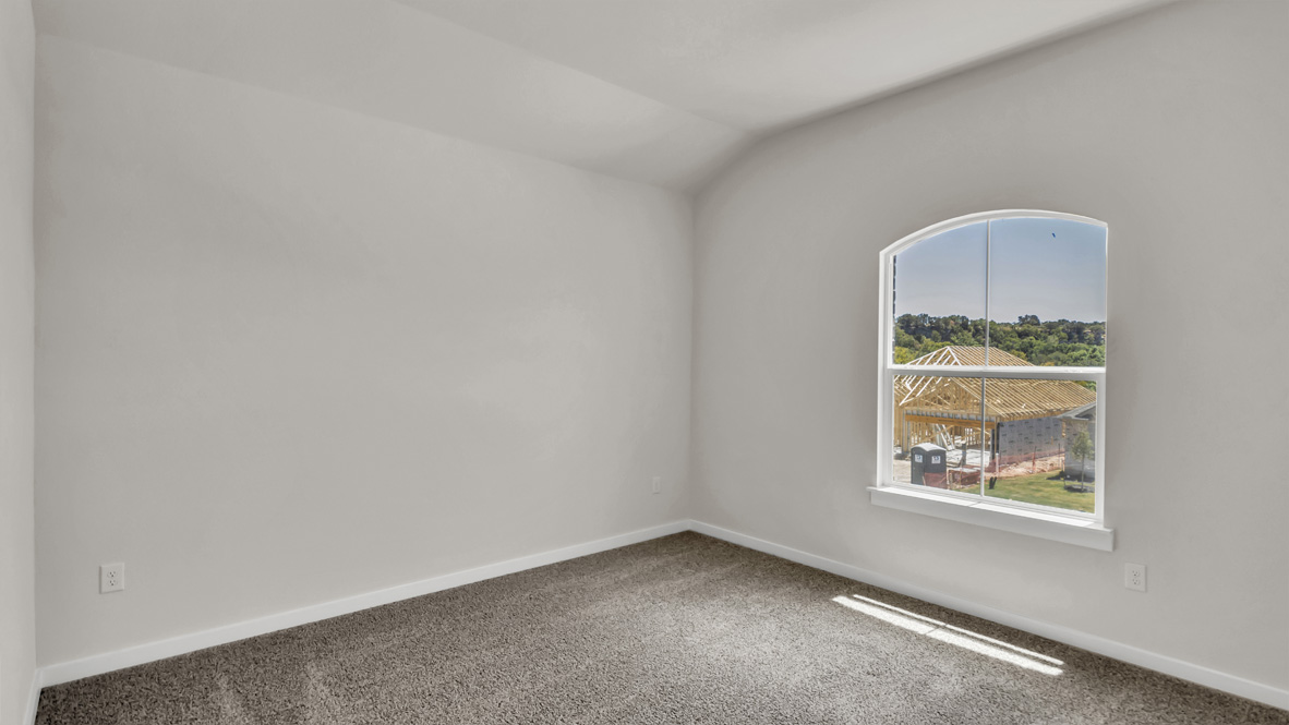 Third bedroom with full closet, direct access to shared upstairs spaces, loft multi-use areas Rosenbusch Ranch