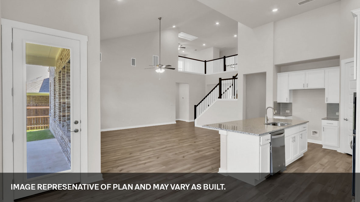 Dining area with view of covered back patio.
