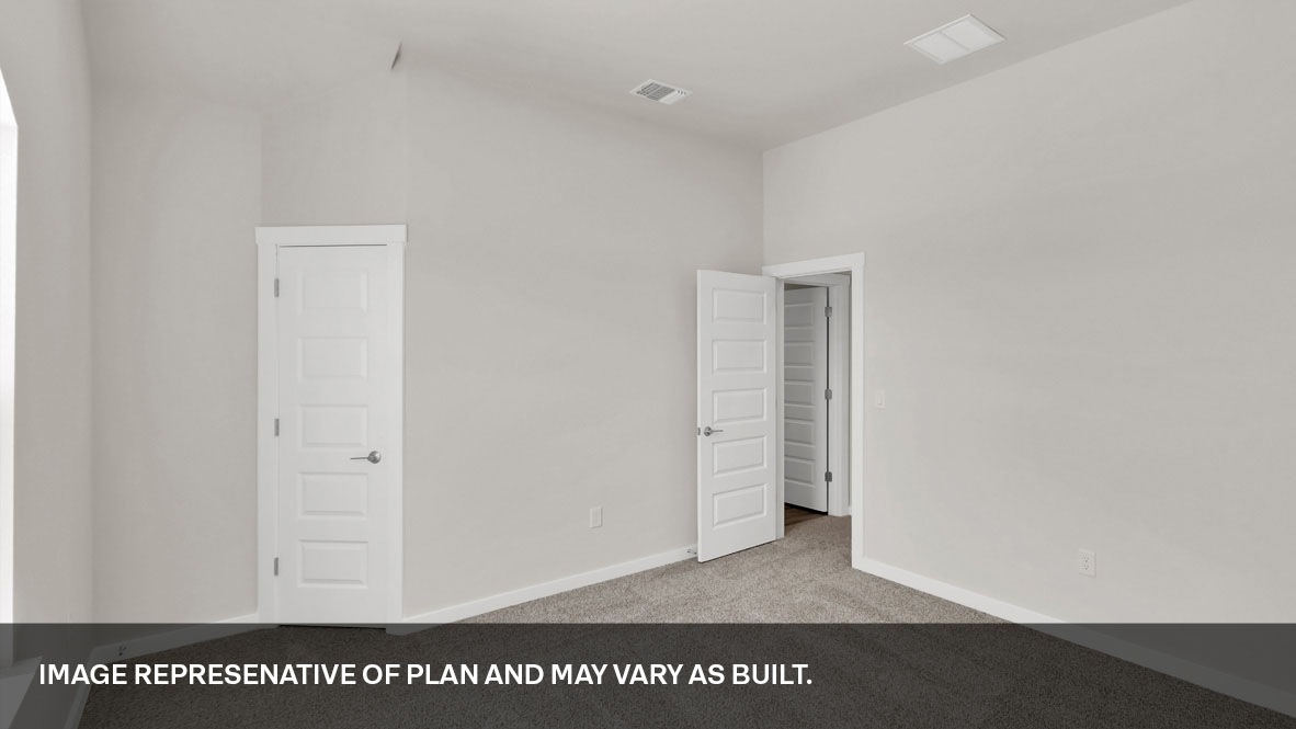Bedroom 4 with carpeted floors and closet.