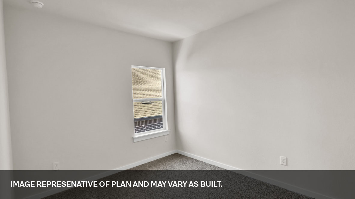 Bedroom 5 located upstairs with window.