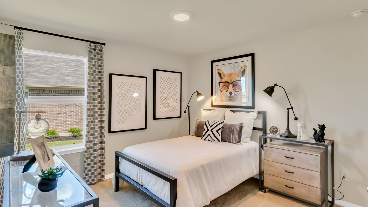 Fourth bedroom design includes ample square footage, privacy from the primary suite, and a centrally accessible to home
