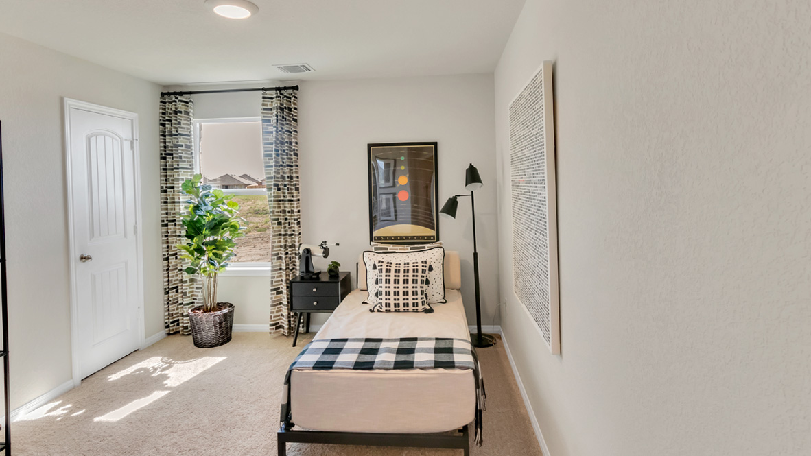 Third bedroom, flex-office, study, entertainment, game, craft room in this new construction D.R. Horton home