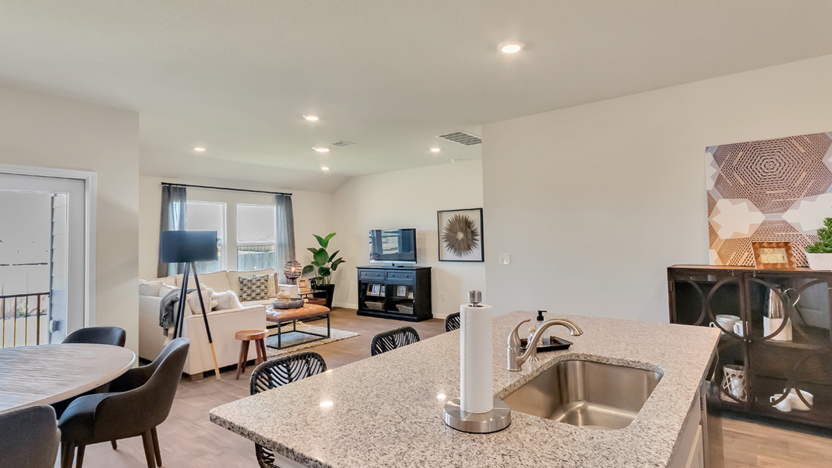 New home kitchen island with sink, seating, pantry, cabinets, new appliance suite included, multi-prep zones, outdoor access