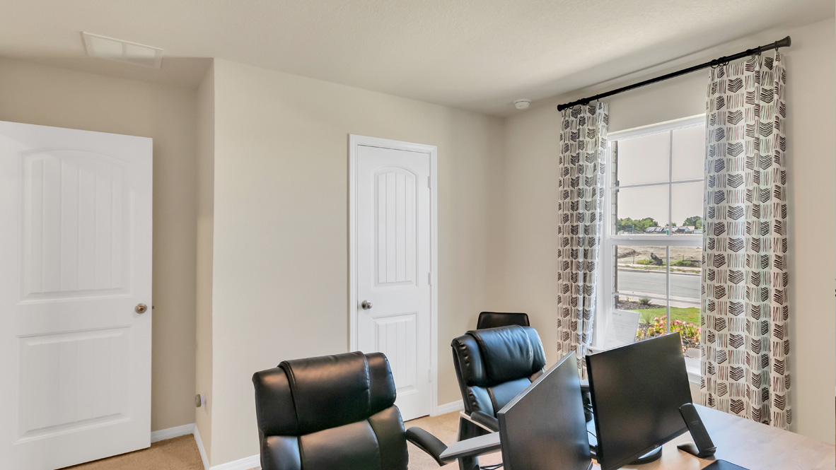 Second bedroom, flex-office, study, entertainment, game, craft room in this new construction D.R. Horton home