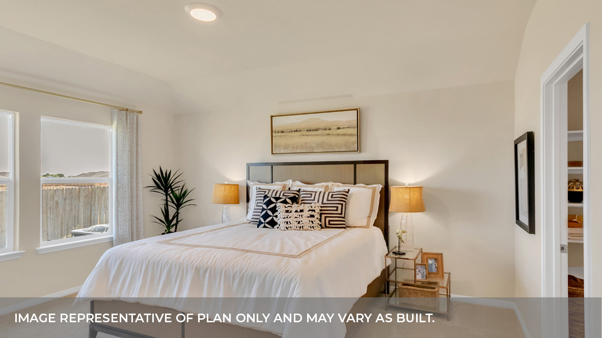 Primary bedroom and door connecting the primary bathroom.