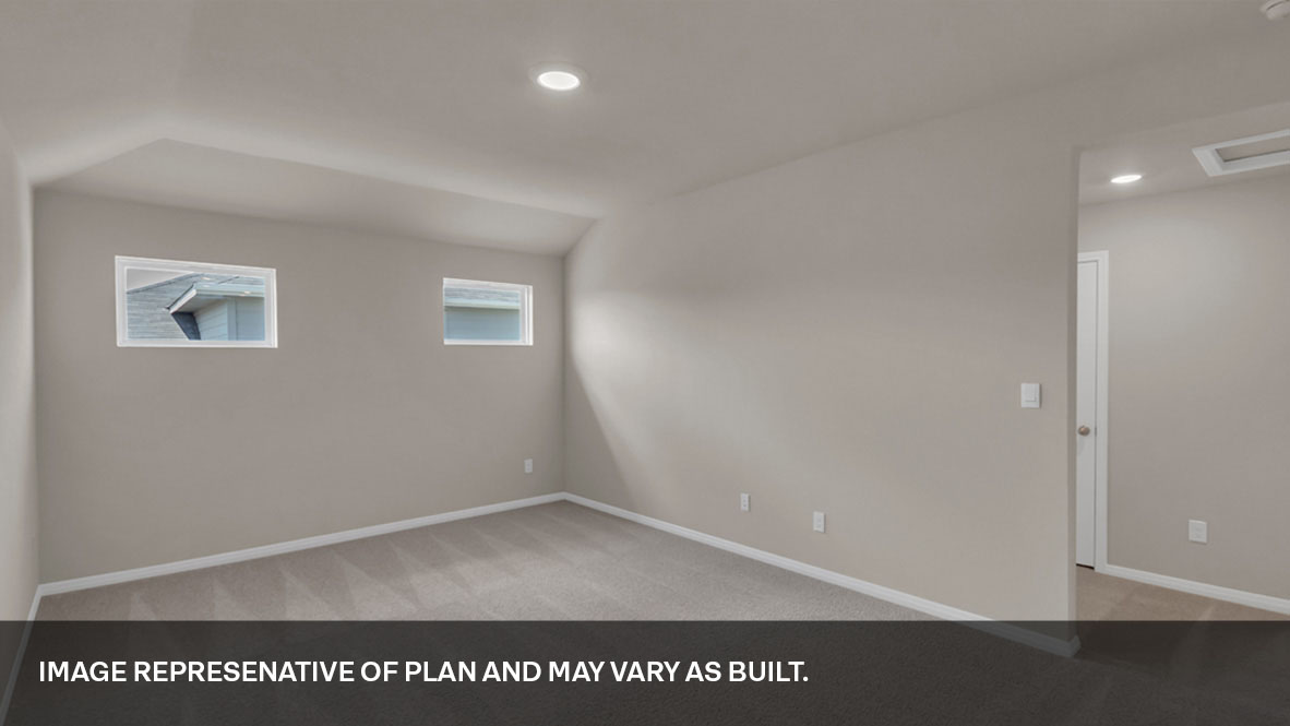 Upstairs loft area with two windows with bedroom to the right.