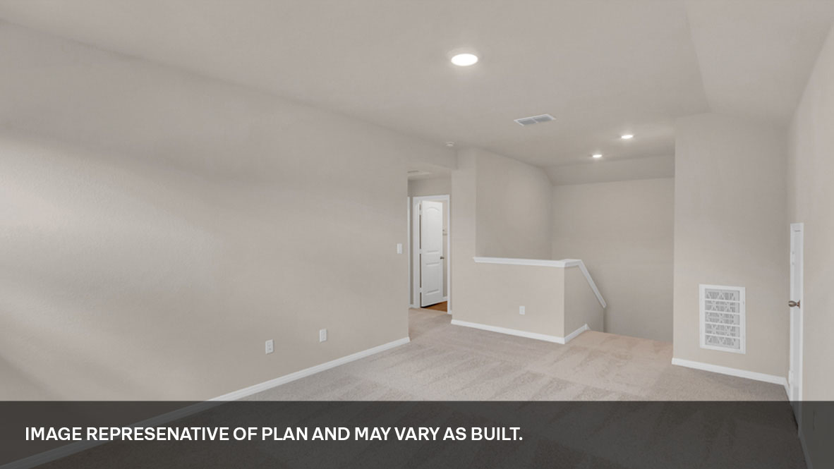 Different view of the loft area and view of the top of the stairs with entry to different rooms on the right.