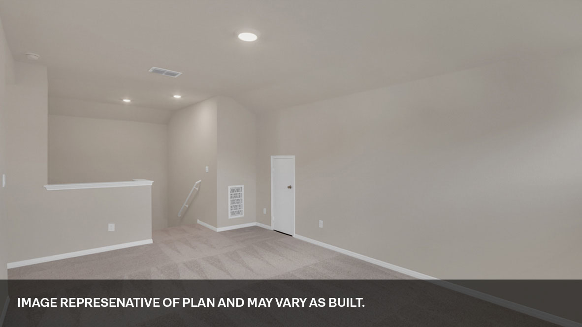 Loft area with view to the top of the stairs.