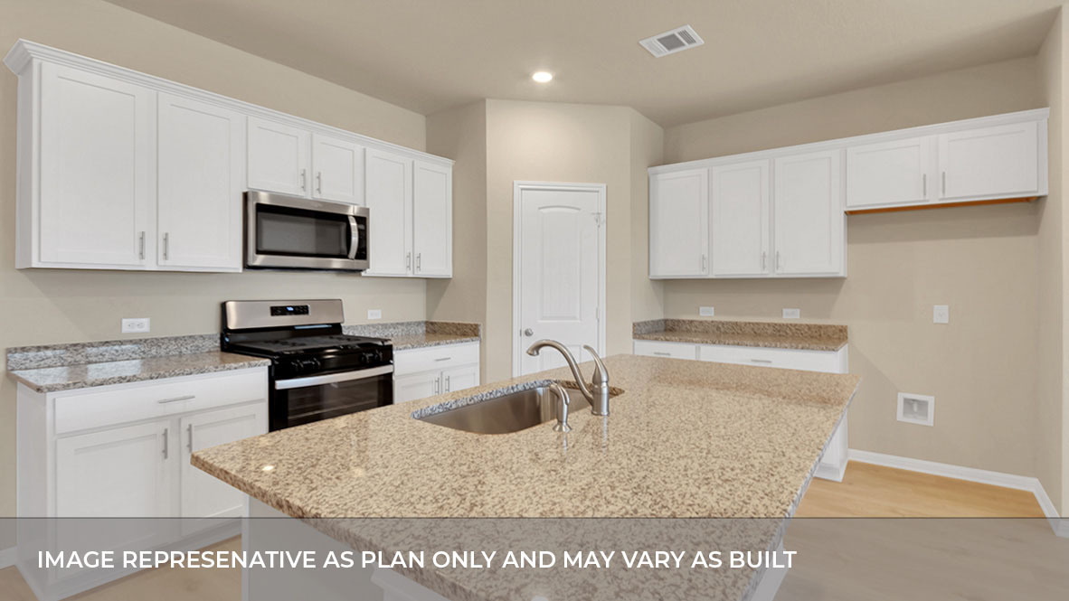 Kitchen with white cabinets and an island with granite countertop.