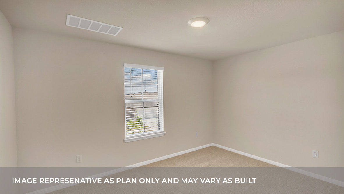 Bedroom with single window and carpet floors.