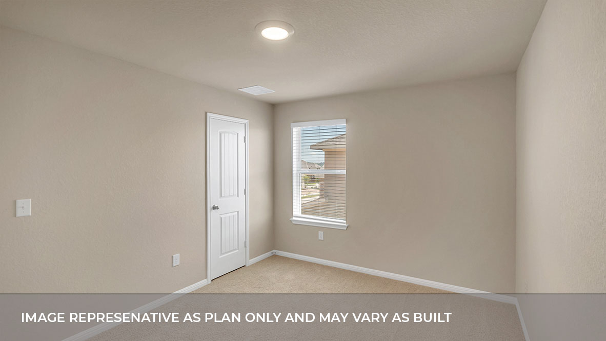 Bedroom with single window and carpet floors.