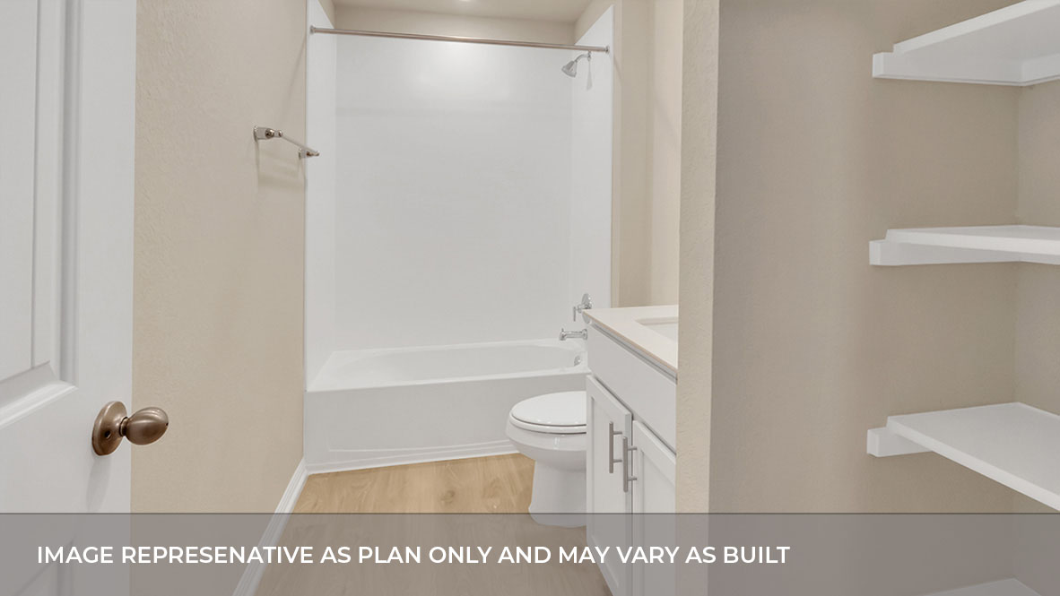 Bathroom with single sink white vanity and light tan granite tops with white tile shower and tub combo.