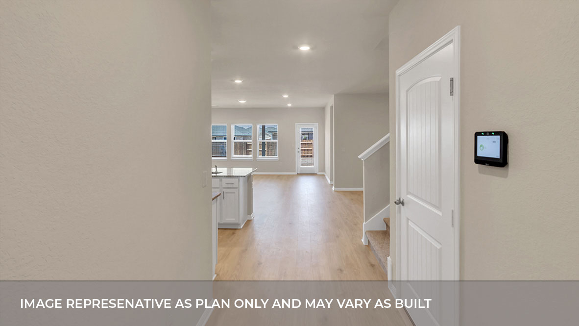 Hallway to the kitchen, living, and dining area.