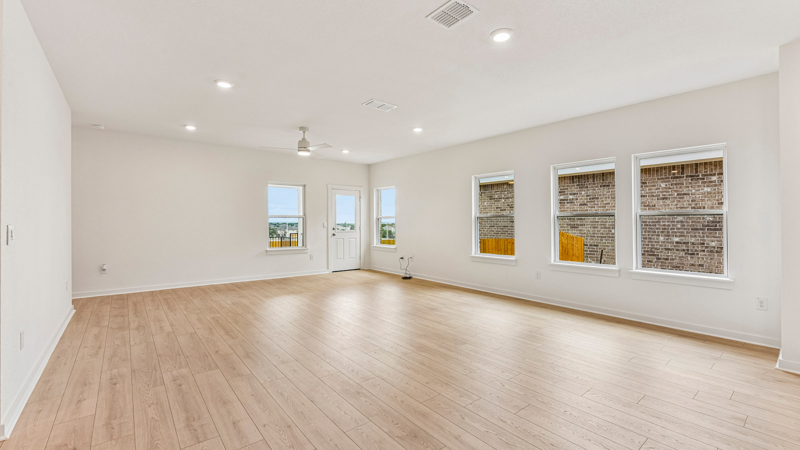 Quincy Open Concept Livingroom with a lot of Natural Lighting