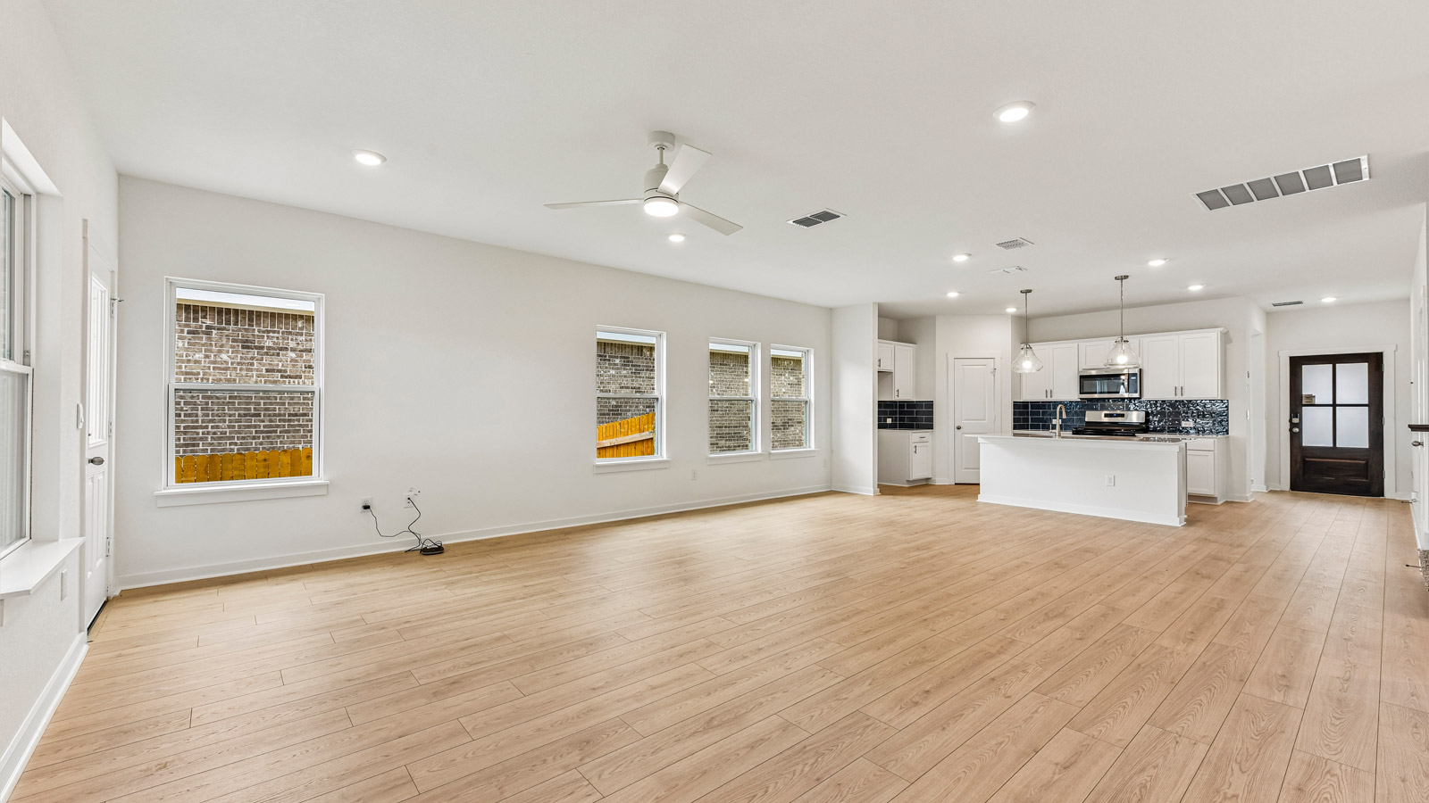 Quincy Open Concept Livingroom with a lot of Natural Lighting